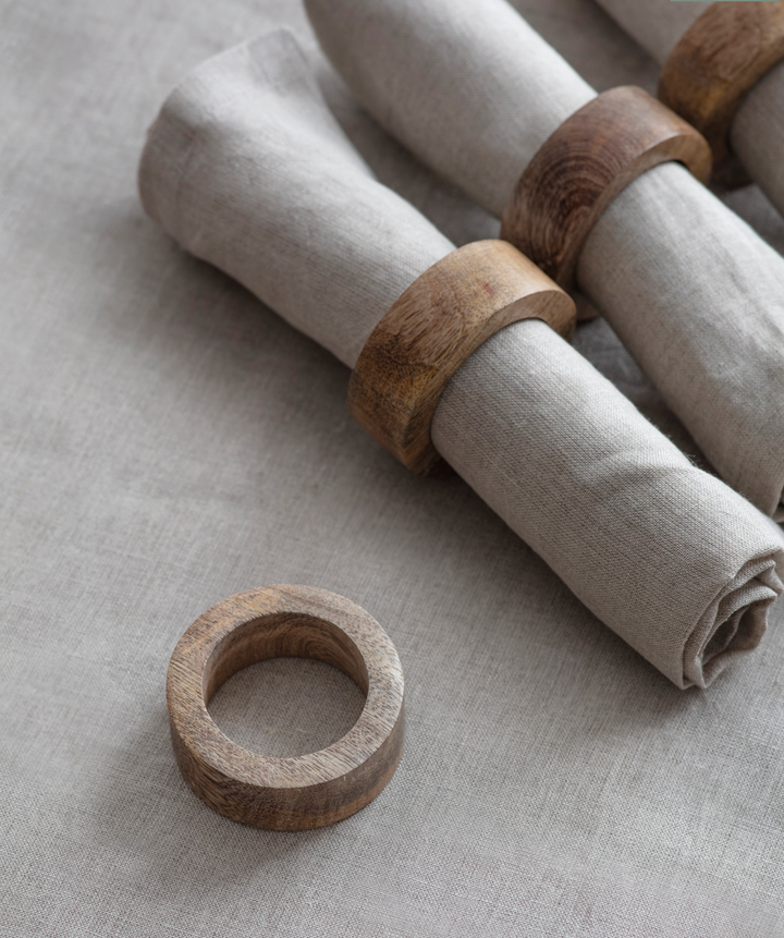 Set of four natural Midford napkin holders by Garden Trading, featuring rustic wooden design for table decor and organization.
