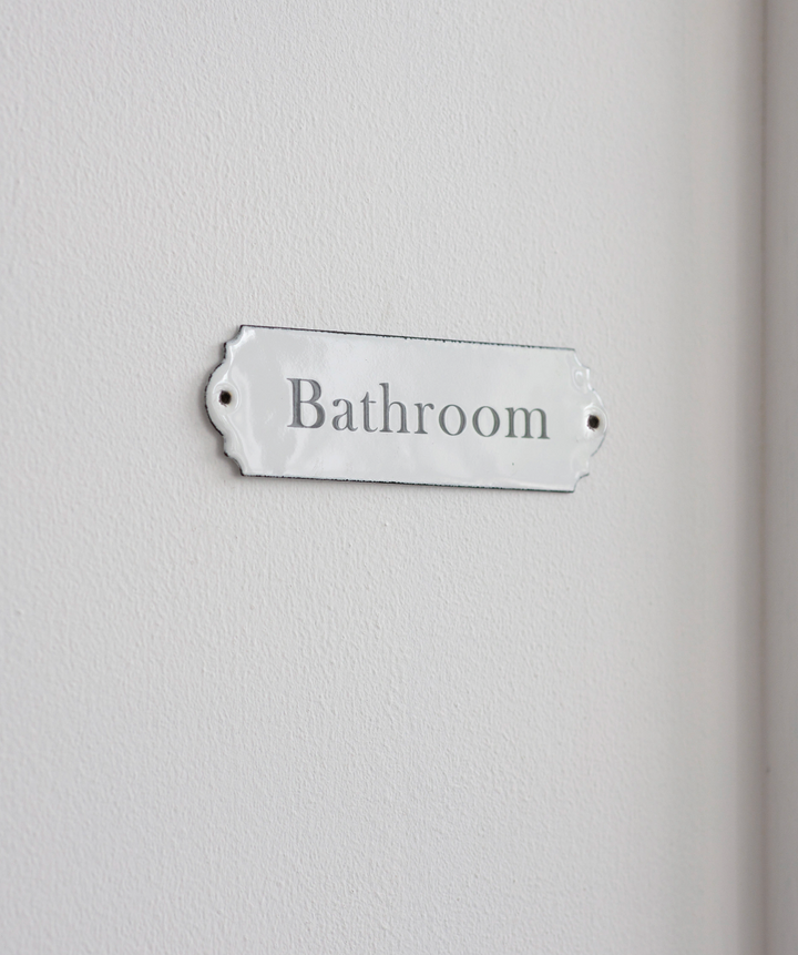 White enamel bathroom sign by Garden Trading, featuring clean, classic design for stylish home decor.