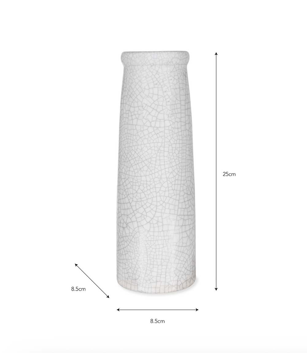 White Ravello Bottle Vase by Garden Trading, shown on a surface with a smooth, curved shape ideal for floral arrangements.