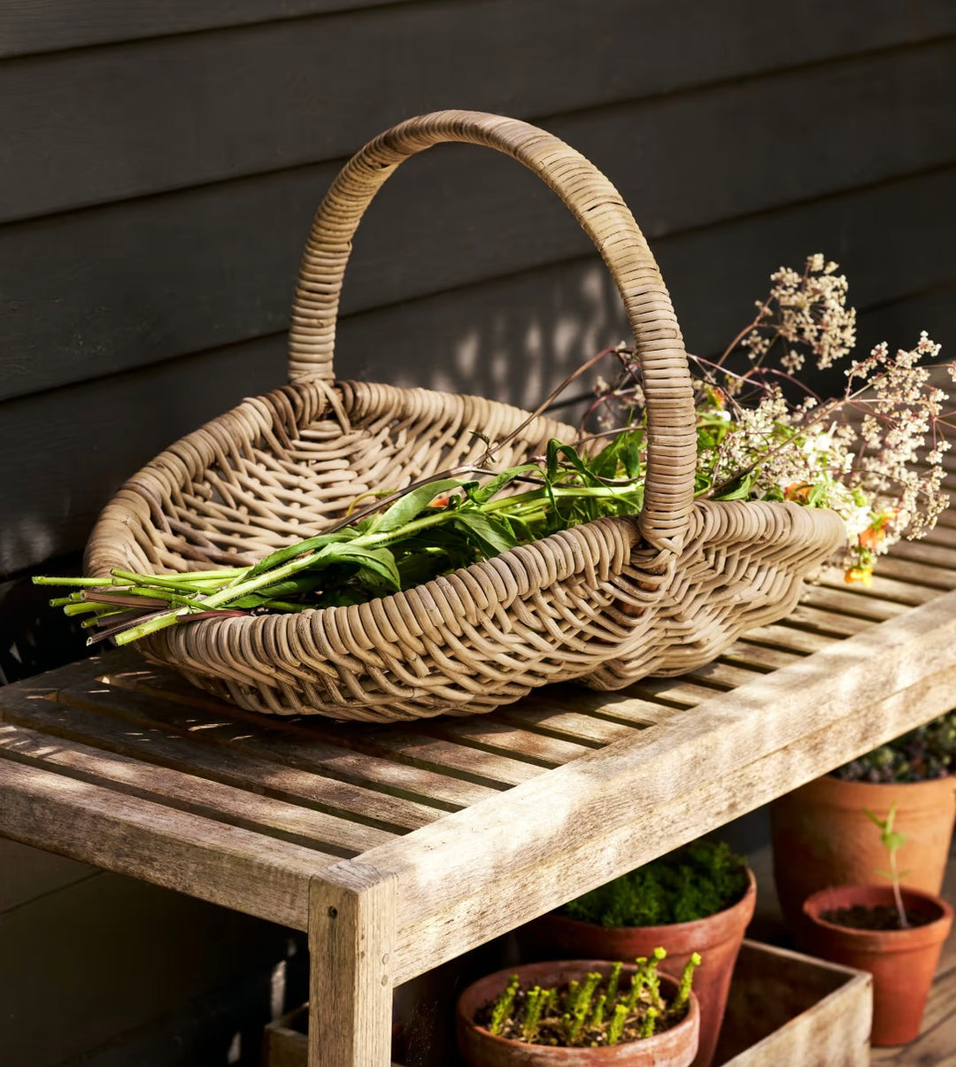 Large Bembridge Rattan Trug from Garden Trading, crafted for garden use, with woven rattan design and sturdy handle.