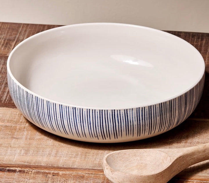 Nkuku Karuma ceramic serving bowl with a smooth, rounded design perfect for serving dishes in a stylish home setting