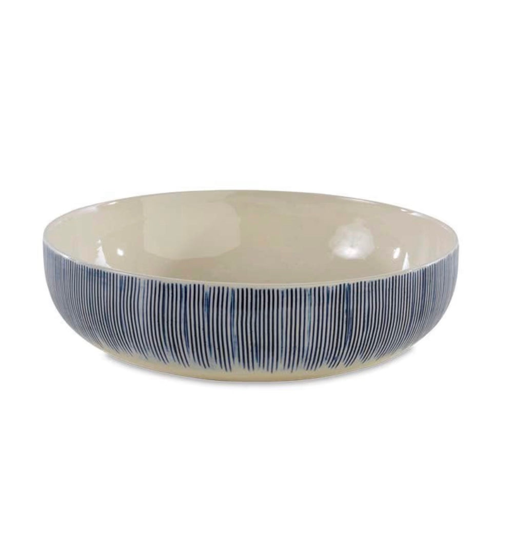 Nkuku Karuma ceramic serving bowl with intricate patterns, perfect for serving salads or side dishes in a stylish kitchen setting.