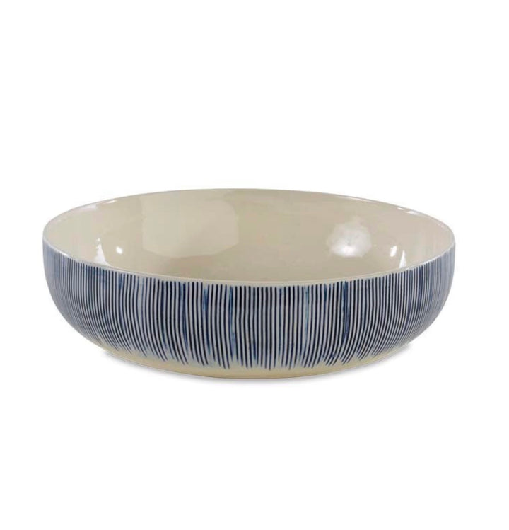 Nkuku Karuma ceramic serving bowl with intricate patterns, perfect for serving salads or side dishes in a stylish kitchen setting.