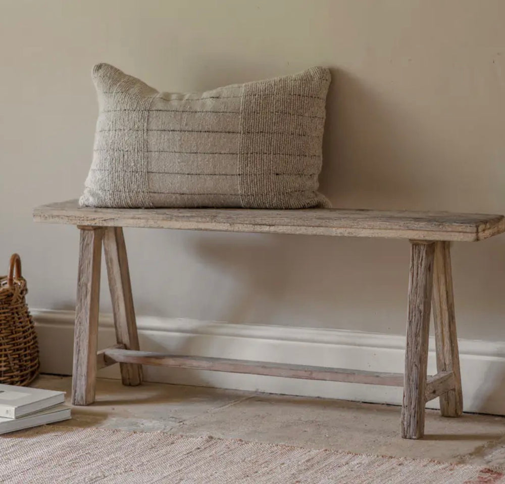 Nkuku Ibo Long Bench made from reclaimed wood, featuring a rustic, handcrafted design perfect for living room or hallway decor.