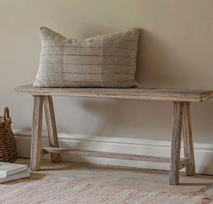 Nkuku Ibo Long Bench made from reclaimed wood, featuring a rustic, handcrafted design perfect for living room or hallway decor.