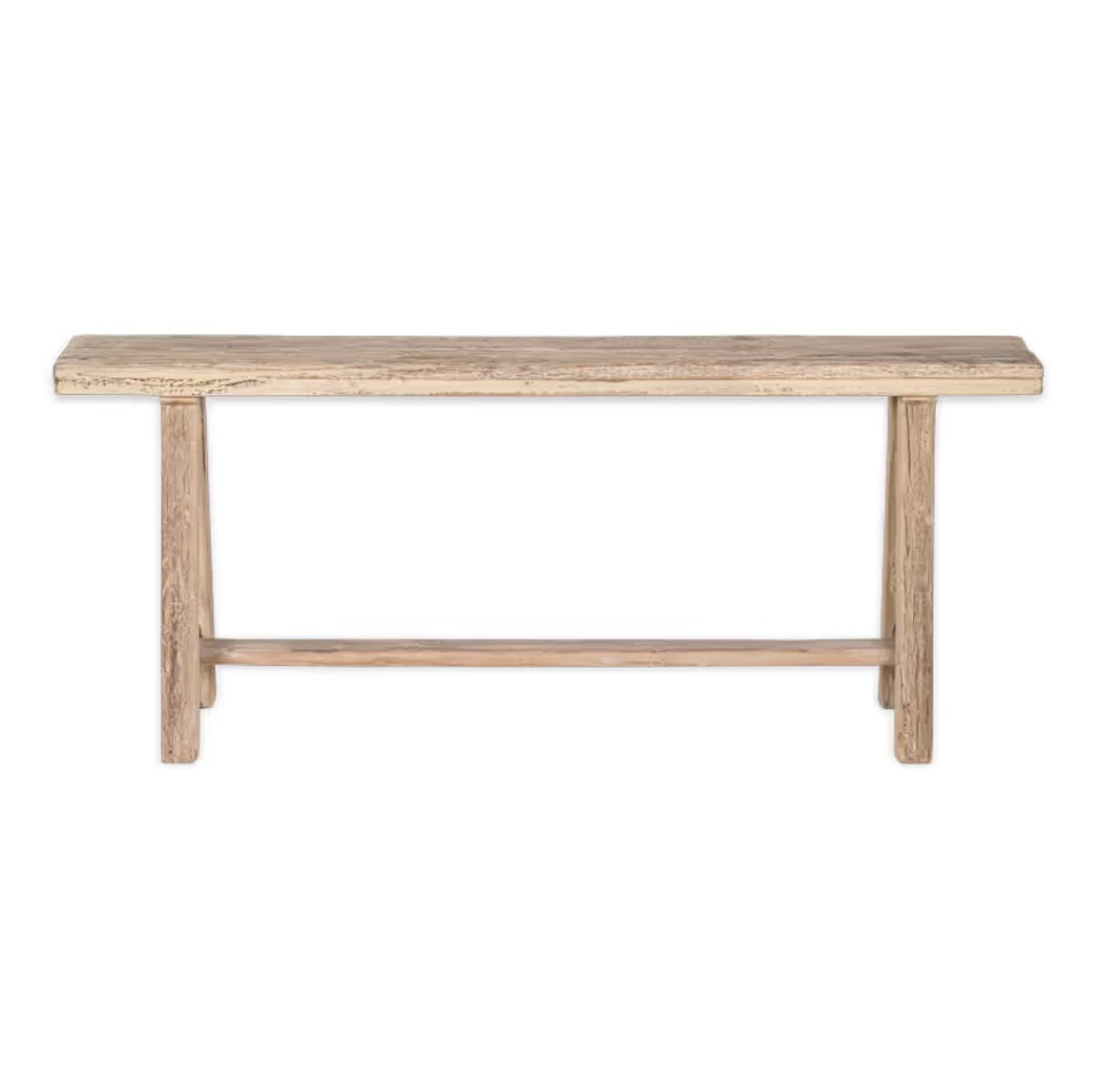 Nkuku Ibo Long Bench made from reclaimed wood, showcasing natural grain and rustic design for stylish, eco-friendly seating.