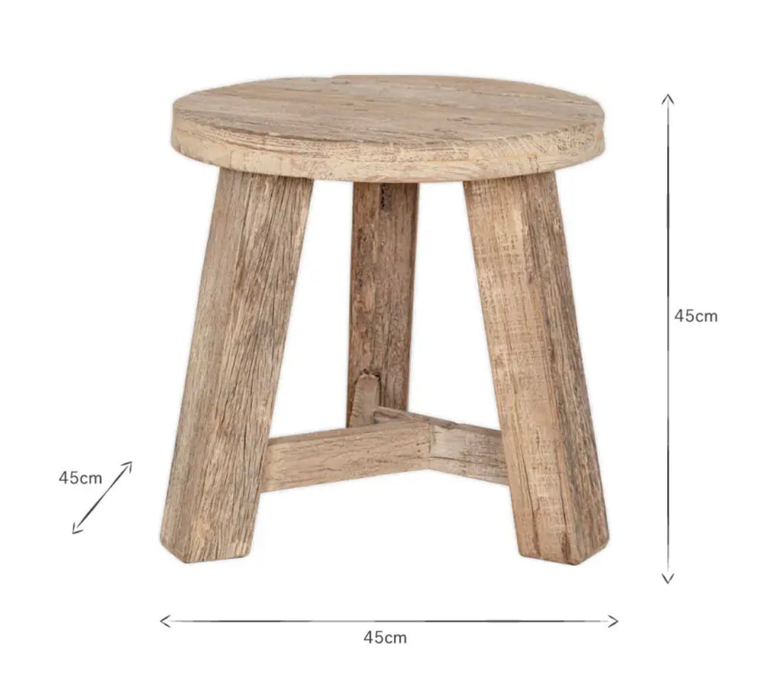 Nkuku Ibo reclaimed wood round side table in natural finish, showcasing rustic wood grain and sturdy design for living room decor.