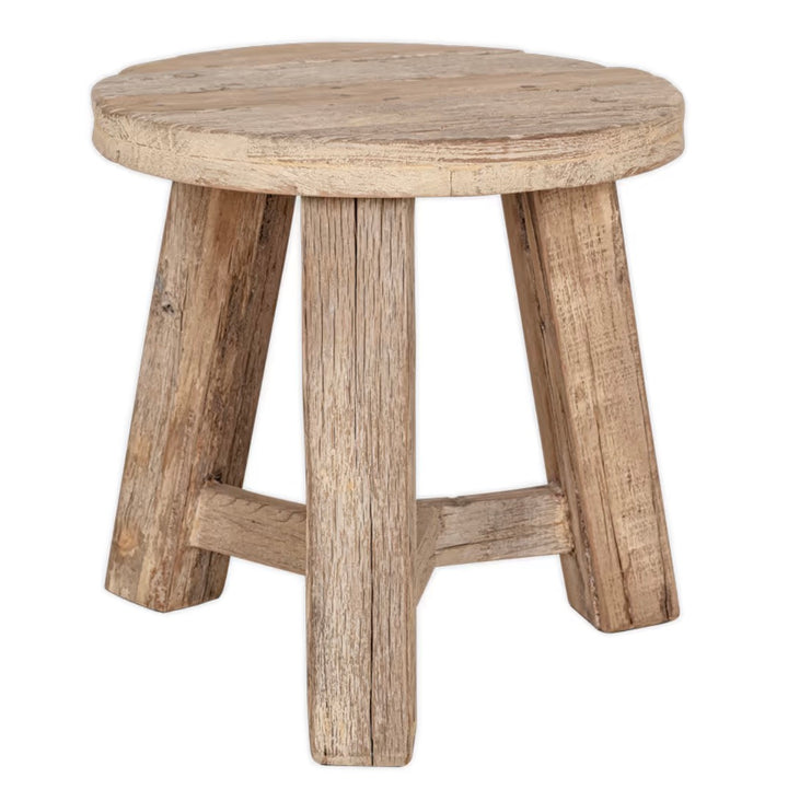 Nkuku Ibo reclaimed wood round side table in natural finish, showcasing a rustic and eco-friendly design with smooth wooden surface.