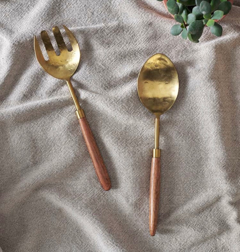 Nkuku Soni Salad Servers set of 2 with gold and acacia wood handles, stylish and durable for serving salads.