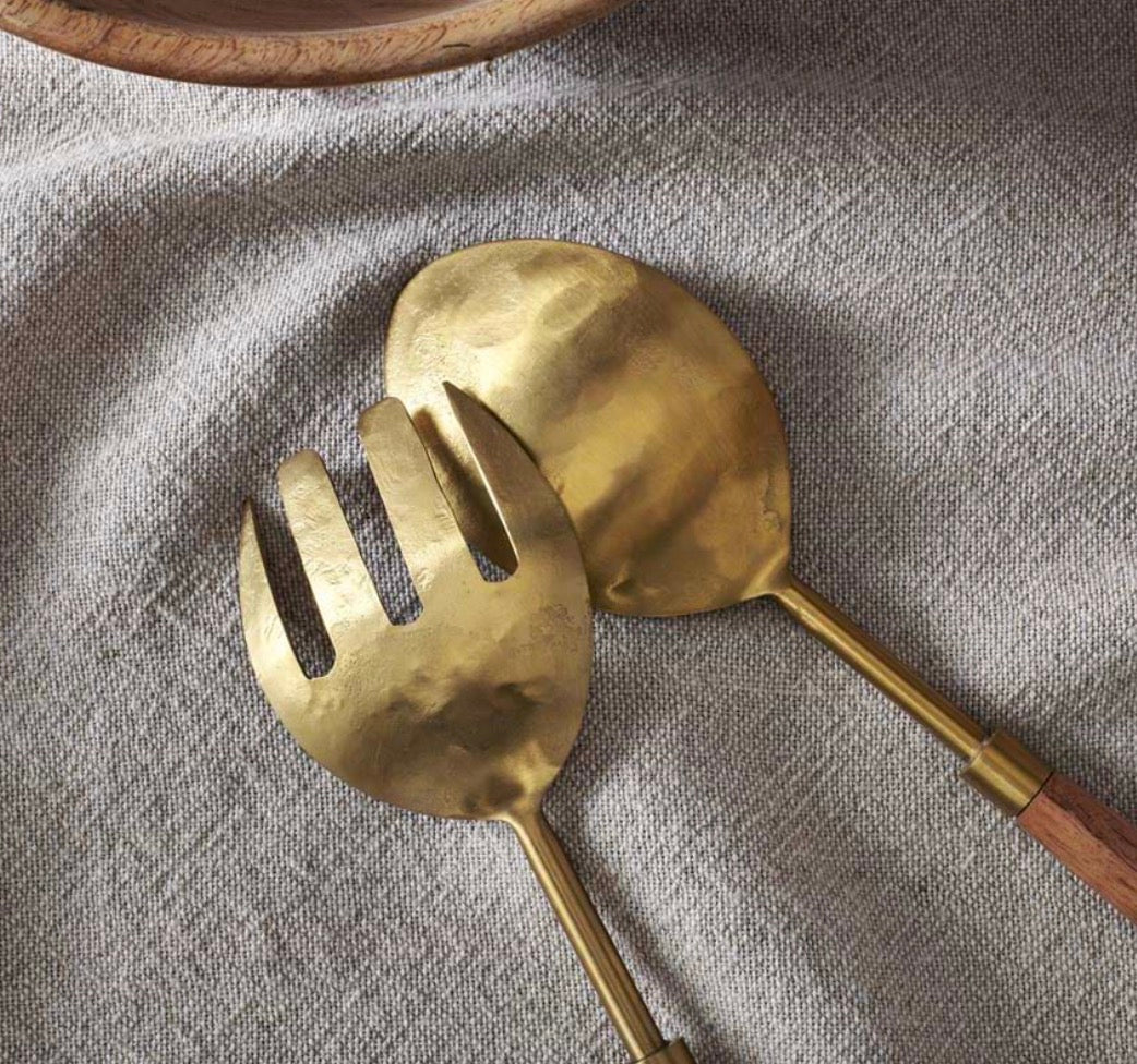 Nkuku Soni Salad Servers set of 2 with gold accents and acacia wood handles, designed by Cornucopia Home and Gift.