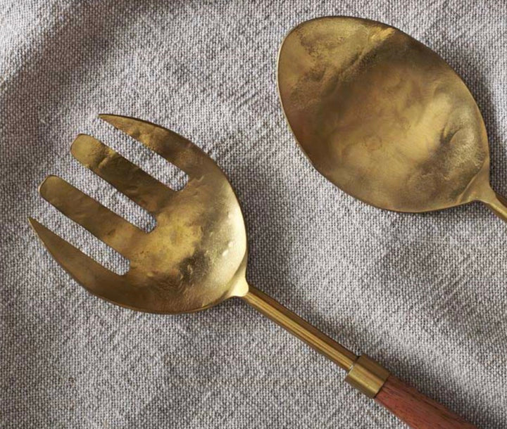 Nkuku Soni Salad Servers set of 2 with gold handles and acacia wood. Elegant, handcrafted salad serving utensils.