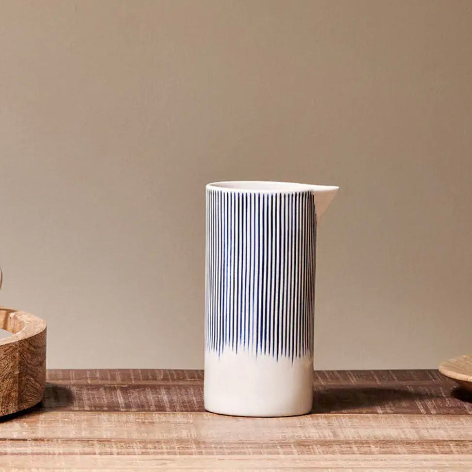 Small Nkuku Karuma ceramic jug with a smooth, glazed finish, ideal for serving or decorative display.
