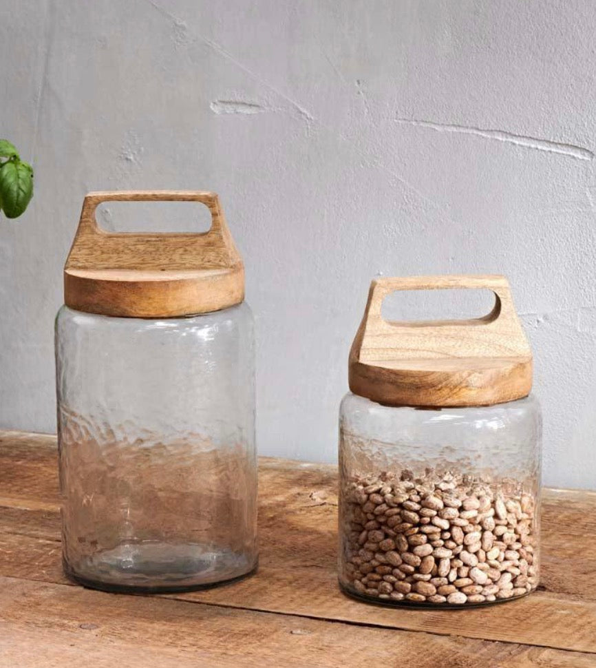 Small Nkuku Kitto Storage Jar with a ceramic lid and woven detail, ideal for kitchen or pantry organization.