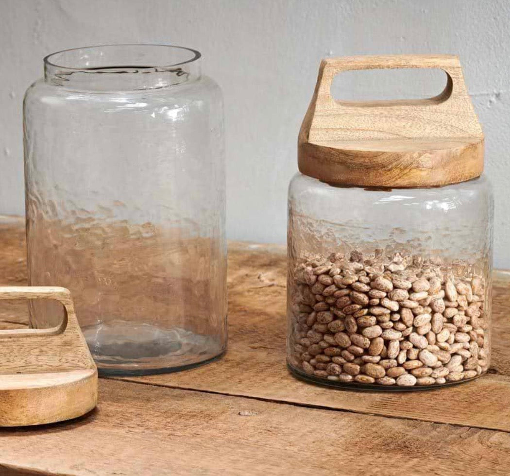 Small Nkuku Kitto Storage Jar with a ceramic lid, featuring a rustic, handcrafted design for kitchen or pantry storage.