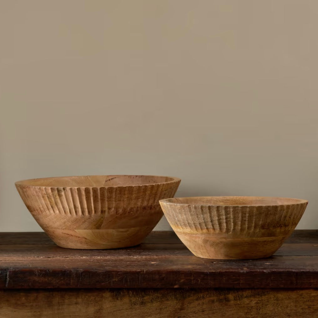 Small Nkuku Gavivi mango wood bowl in natural finish, showcasing its smooth, handcrafted design and warm wood grain.