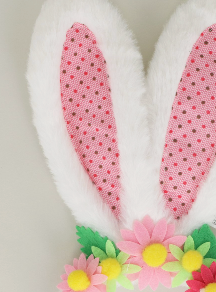 Faux fur bunny ears headband with colorful flowers for Easter, by Gisela Graham, designed for festive holiday accessories.