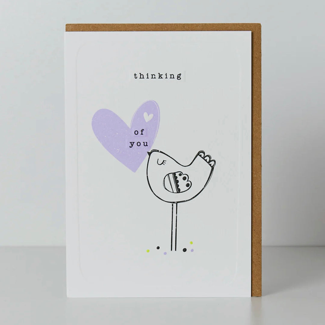 Belly button-shaped Thinking Of You Bird Card by Cornucopia Home and Gift, featuring a charming bird design on a card.