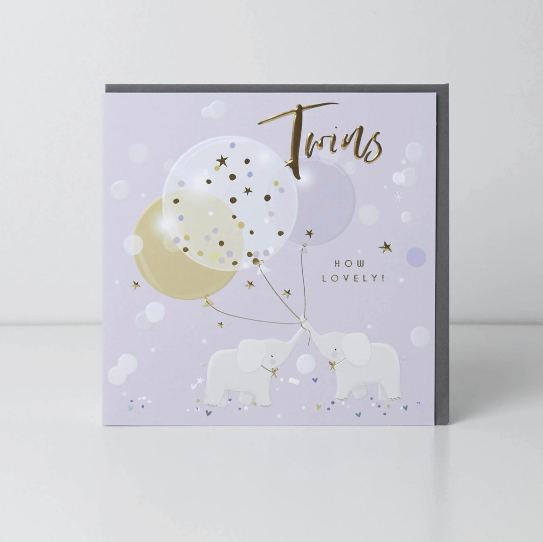 Belly button baby twins elephants card with cute elephant illustrations, perfect for baby shower or greeting card occasions.