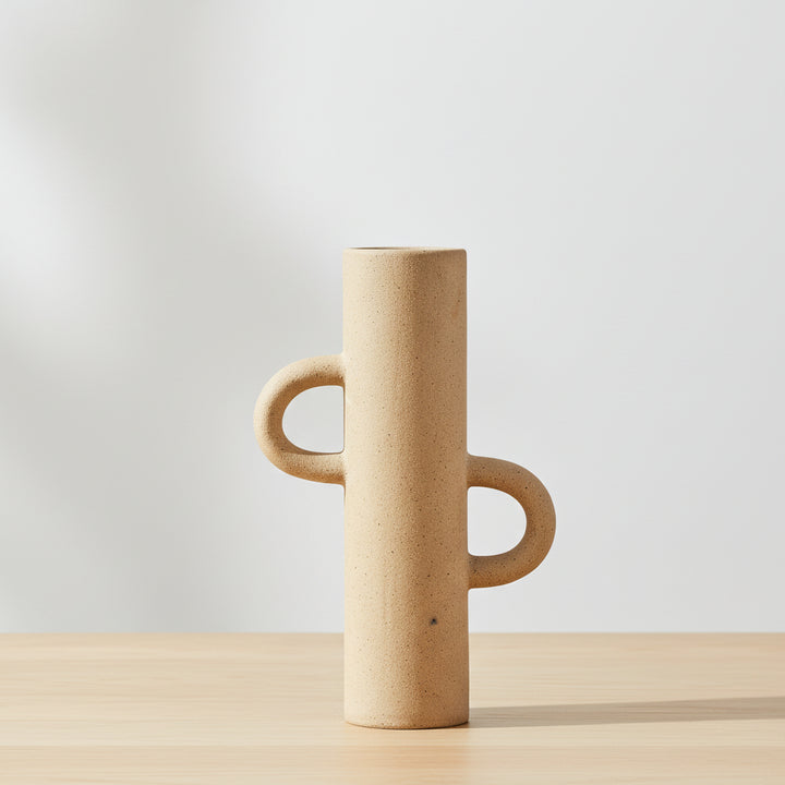 Large Sigga Vase in oatmeal color from Cornucopia Home and Gift, showing its textured ceramic surface and elegant shape.