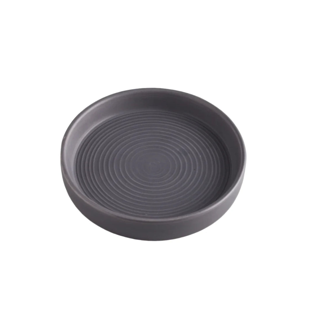 Small dark grey candle holder from St Eval, designed by Cornucopia Home and Gift, ideal for holding candles or creating cozy ambiance.