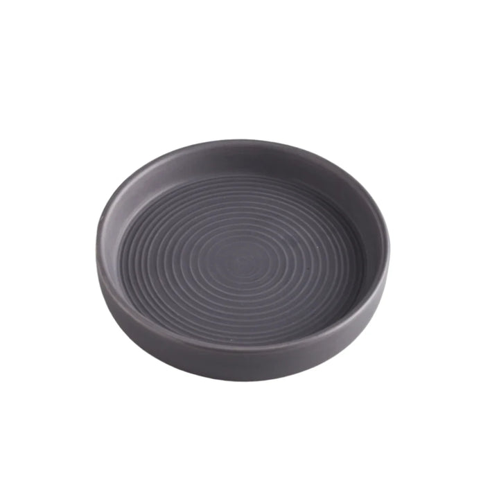 Small dark grey candle holder from St Eval, designed by Cornucopia Home and Gift, ideal for holding candles or creating cozy ambiance.
