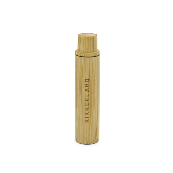 Kikkerland on-the-go bamboo toothbrush with eco-friendly design, featuring a biodegradable handle and compact travel case.
