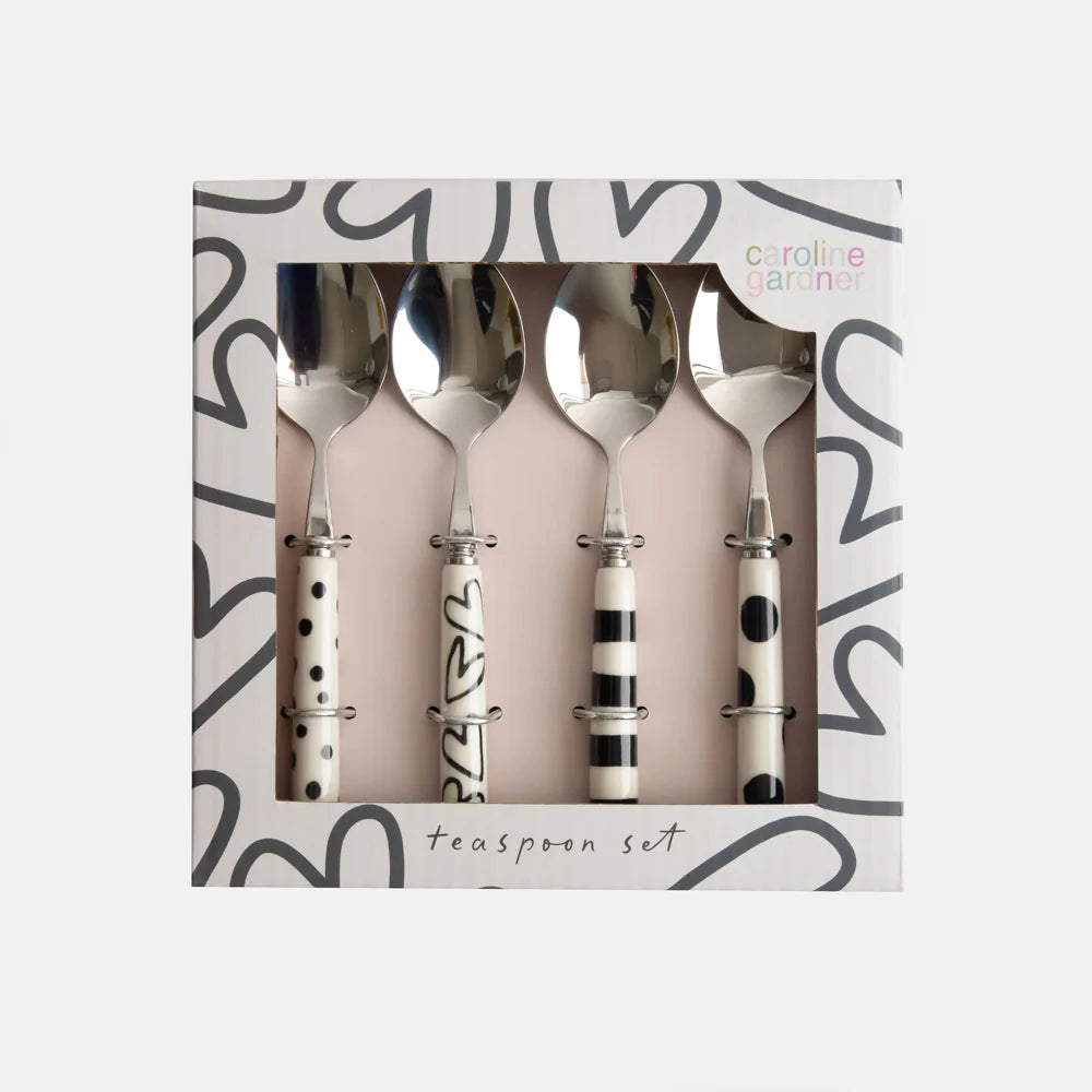 Set of four Caroline Gardner mono pattern teaspoons in a gift box, featuring colorful and decorative designs.