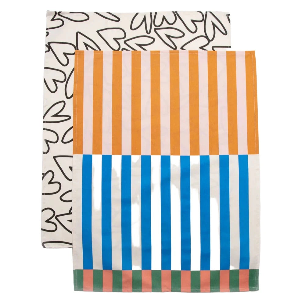 Set of two Caroline Gardner tea towels featuring multicolored stripes and mono hearts, perfect for stylish kitchen decor.