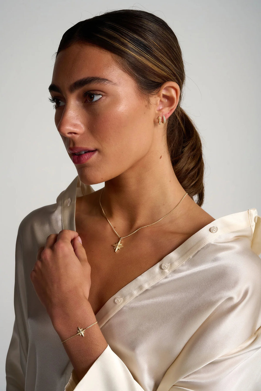 Gold Faith Necklace by Tutti &amp; Co featuring a delicate pendant hanging from a fine chain.