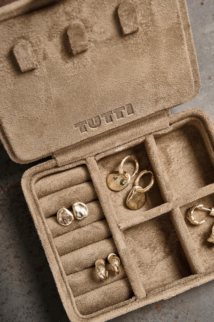 Sand mini suede jewellery box by Tutti &amp; Co from Cornucopia Home and Gift, featuring a stylish compact design with interior compartments.