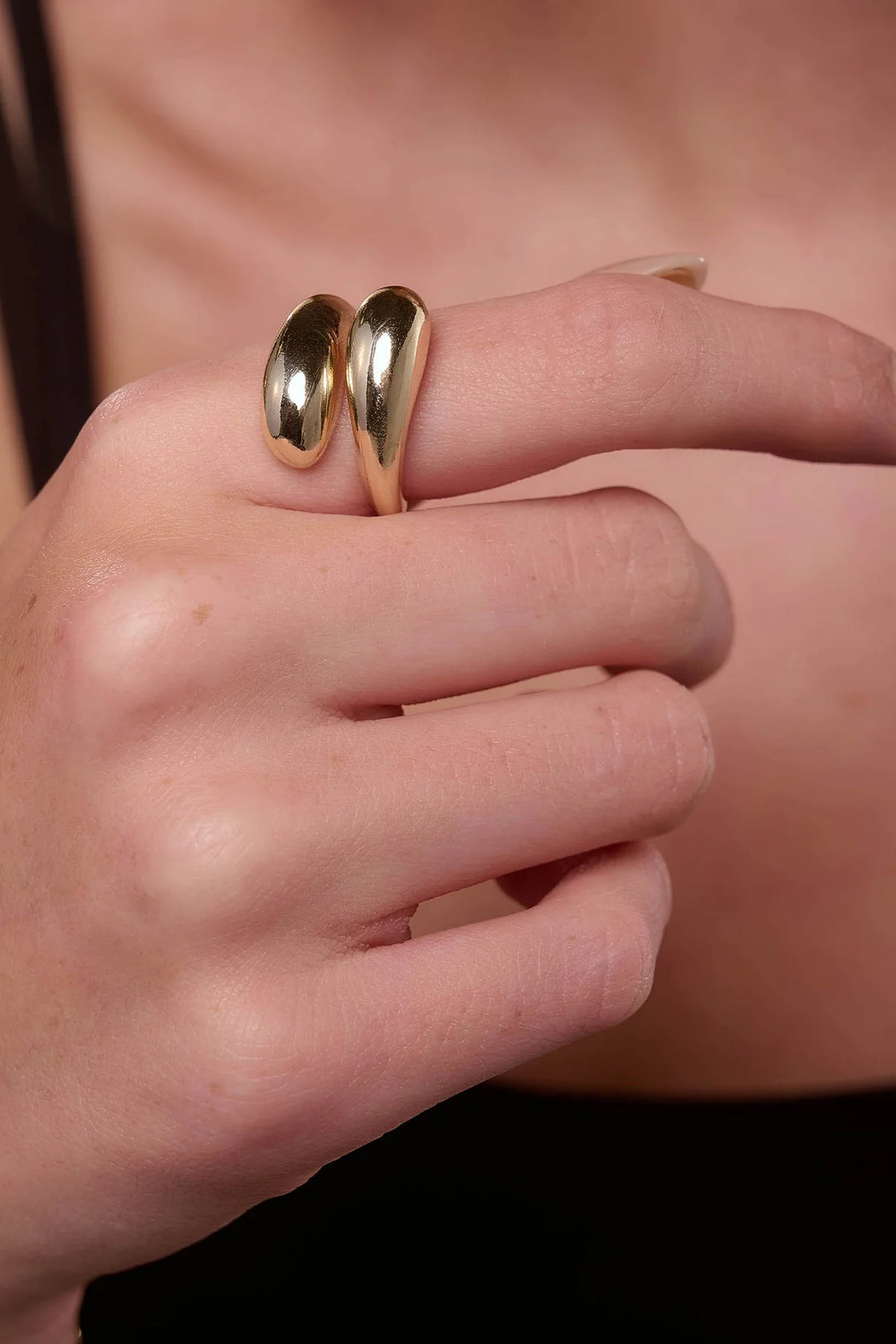 Gold Hampstead Ring by Tutti &amp; Co featuring a sleek, minimalist design with a smooth finish, displayed on a neutral background.