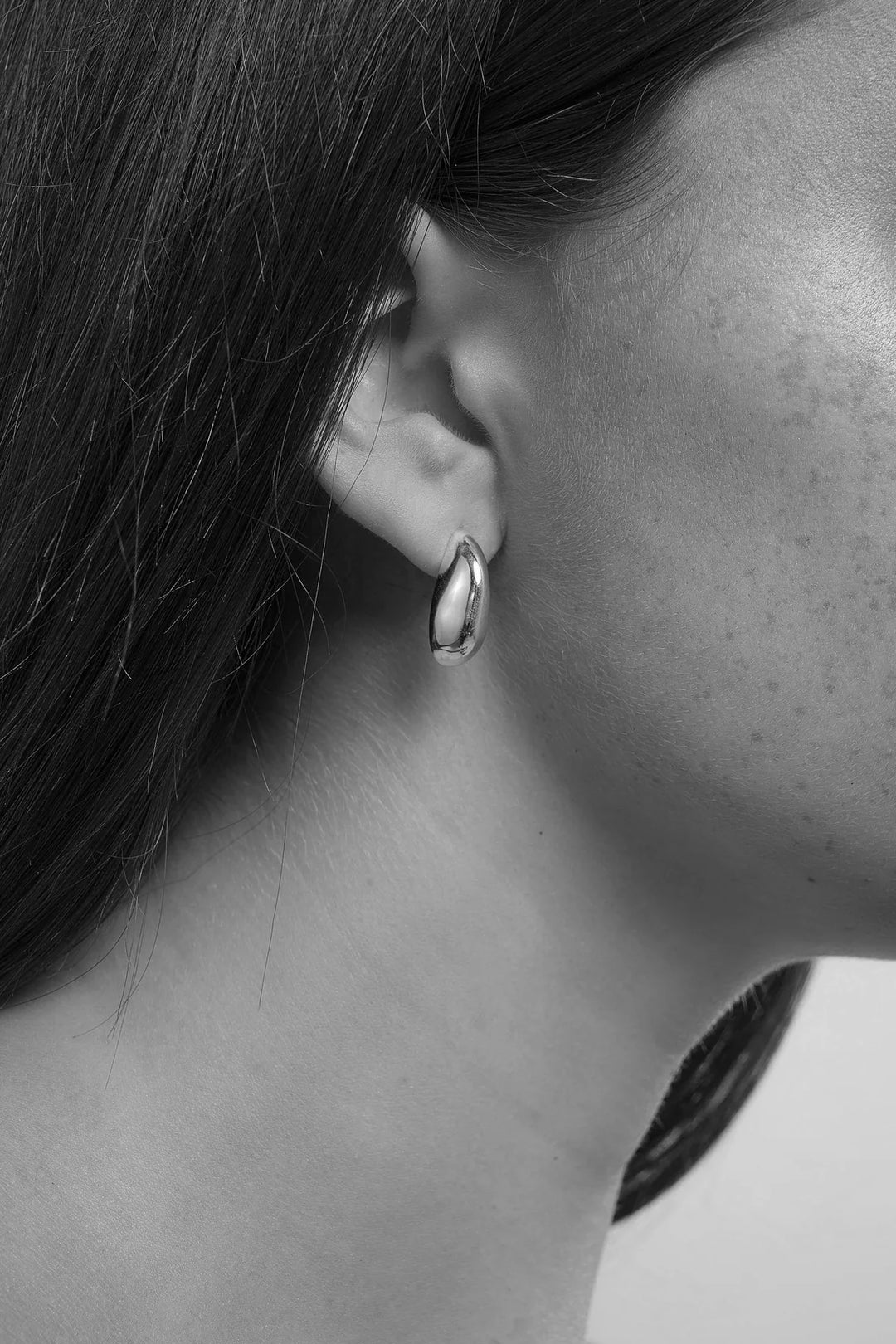 Silver Sloane Earrings by Tutti &amp; Co featuring sleek, modern design with polished finish, displayed on a neutral background.