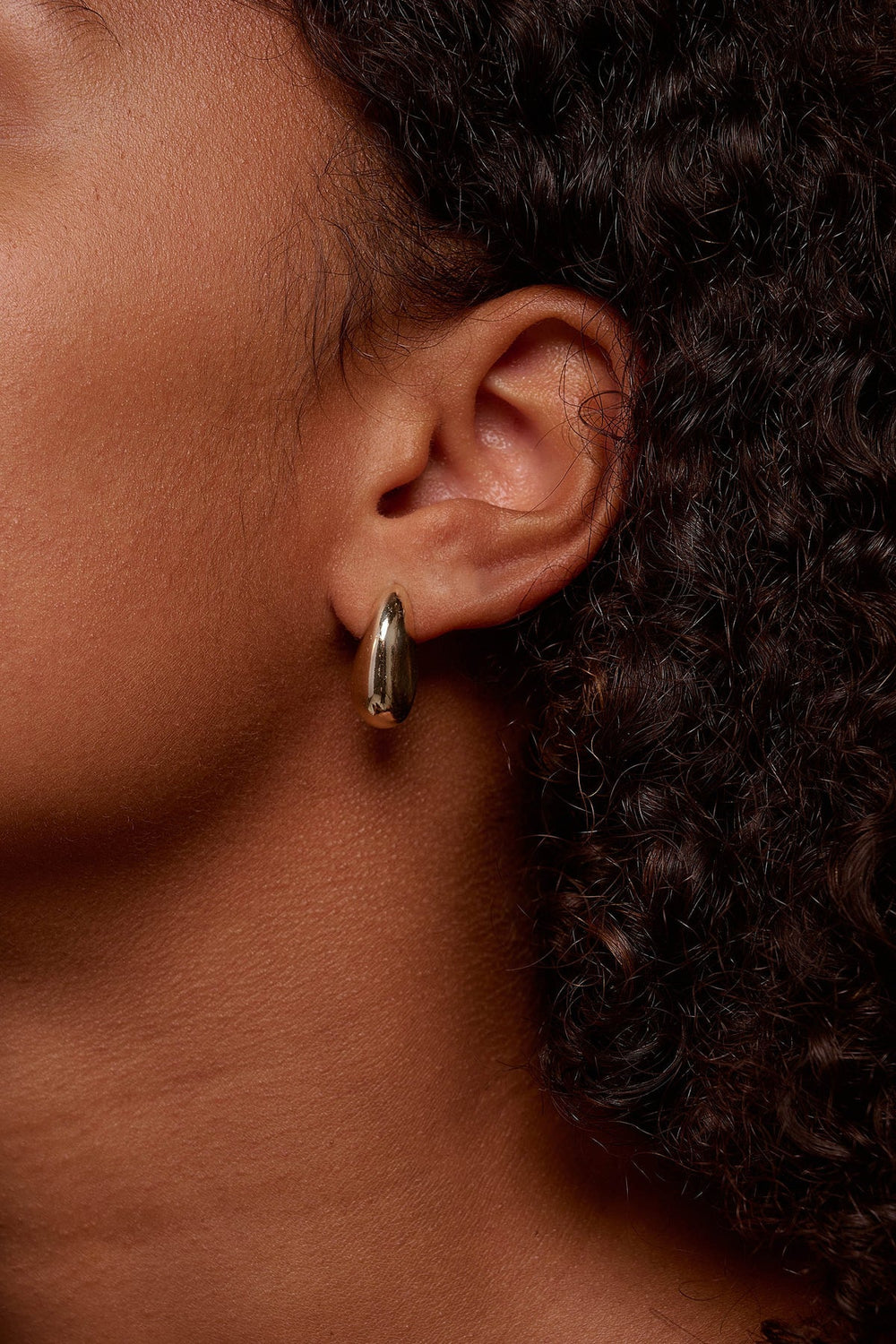 Gold Sloane Earrings by Tutti & Co featuring a sleek, minimalist design with polished finish.
