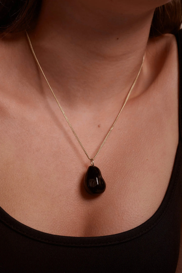 Black enamel Portobello necklace by Tutti &amp; Co, featuring a stylish pendant on a delicate chain.