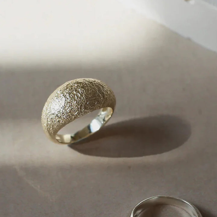 Gold Still Ring by Tutti &amp; Co featuring a smooth, polished design with a modern, minimalist style.
