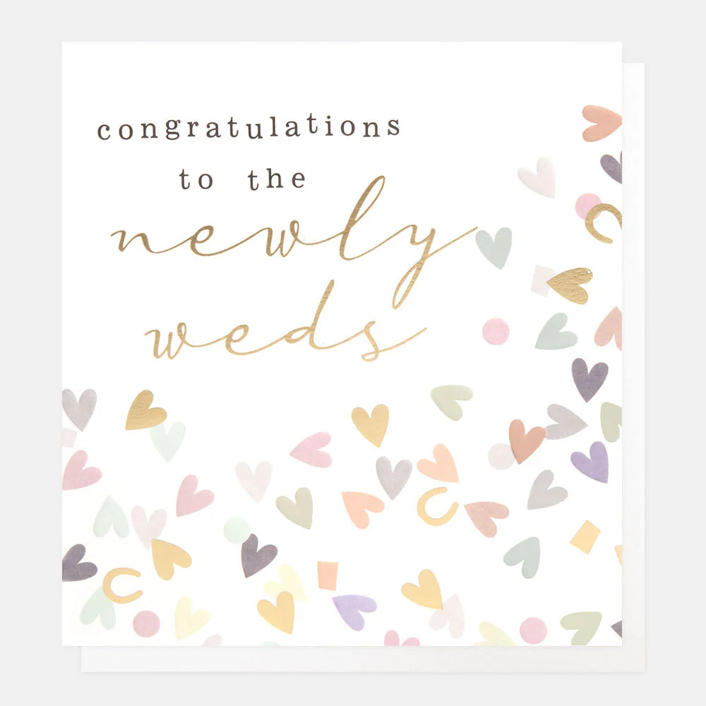 Caroline Gardner The Newlyweds wedding print on white background, featuring elegant text and floral accents for wedding decor.