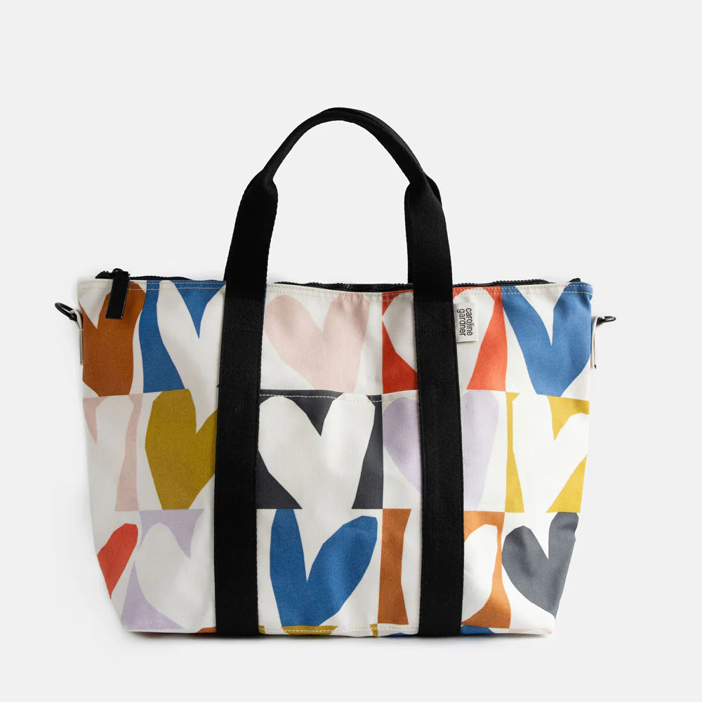 Caroline Gardner Checkmate Heart Weekend Bag featuring a colorful checkered pattern, ideal for travel or weekend trips