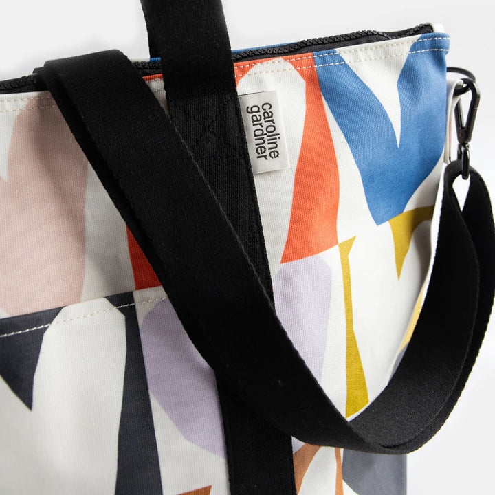 Caroline Gardner Multi Checkmate Heart Weekend Bag with checkered pattern and heart details, ideal for travel or weekend trips.