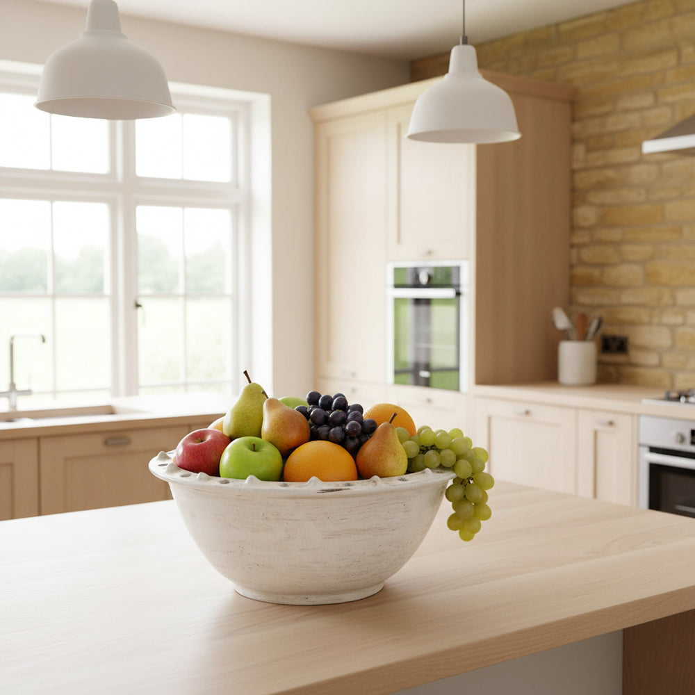 White distressed ceramic bowl by Cornucopia Worcester from Coach House, featuring a rustic, textured finish perfect for serving or display.