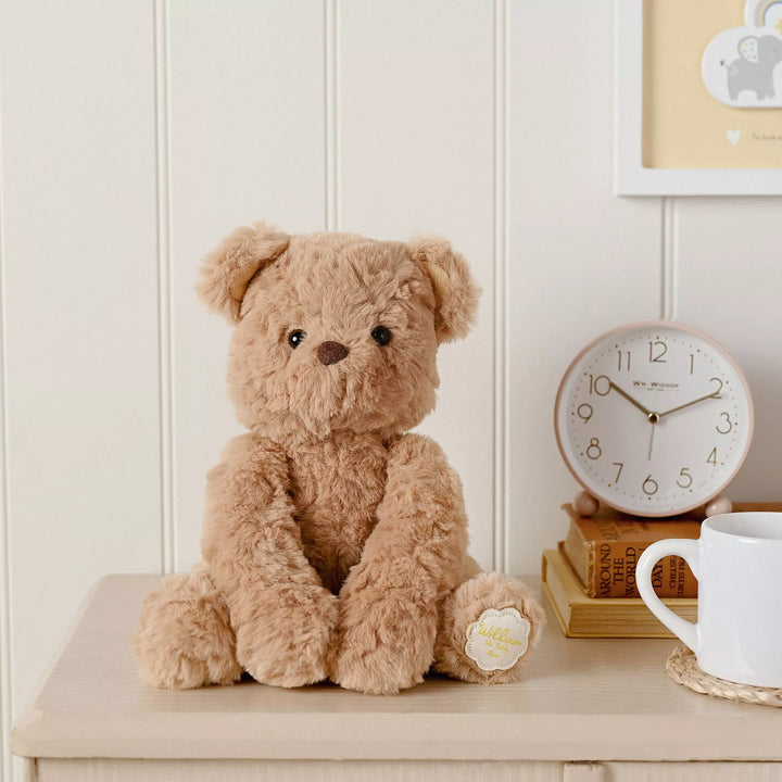 Soft brown William plush sitting teddy bear by Widdop &amp; Co for Cornucopia Home and Gift, featuring a cuddly, plush teddy with a gentle expression.