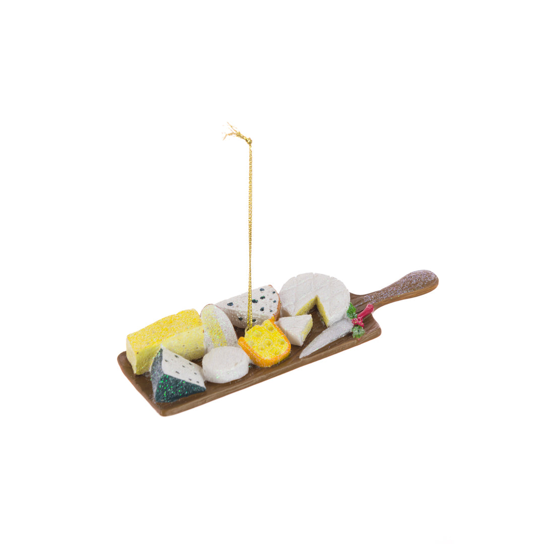 Colorful floral cheese board decoration from Floralsilk Christmas 2025 by Cornucopia Home and Gift, featuring festive floral designs.