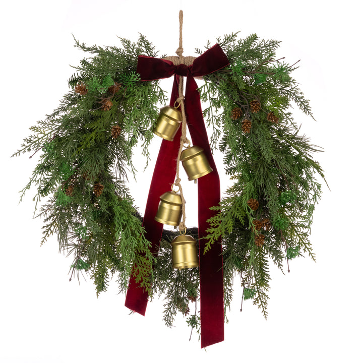 Red Belmesthorpe wreath with bow and bells, floral silk Christmas decoration by Cornucopia Home and Gift.