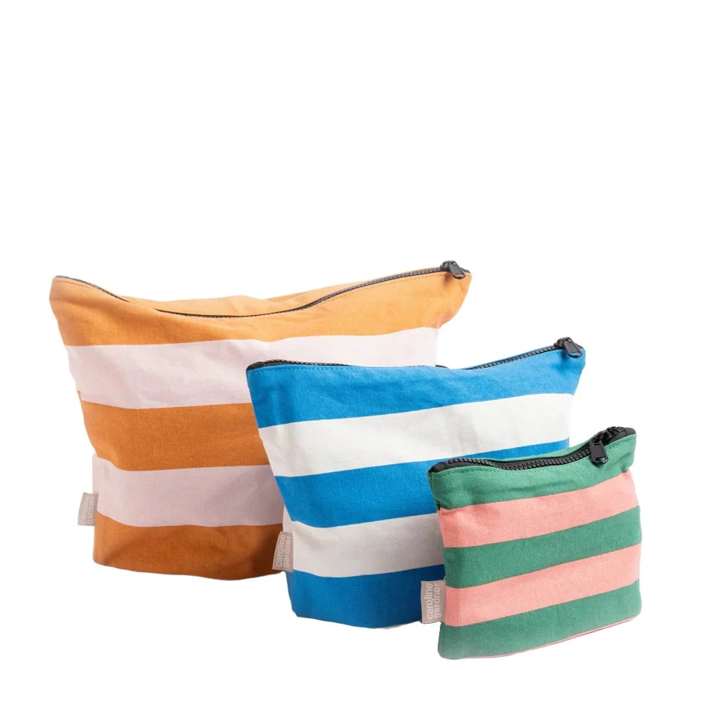 Set of three Caroline Gardner multi stripe travel pouches with colorful patterns, ideal for organizing essentials during trips.
