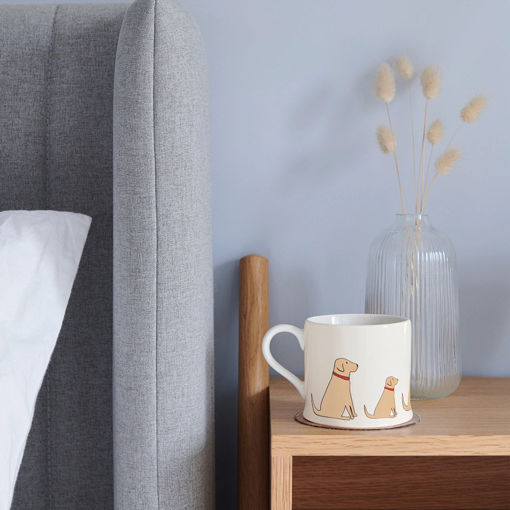 Yellow Labrador dog mug by Sweet William featuring a cheerful Labrador illustration on a ceramic cup.