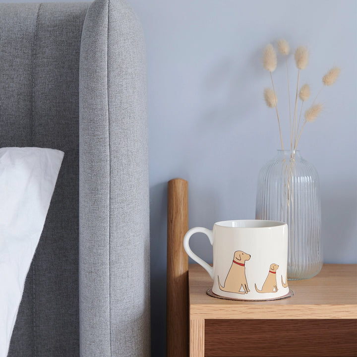 Yellow Labrador dog mug by Sweet William featuring a cheerful Labrador illustration on a ceramic cup.