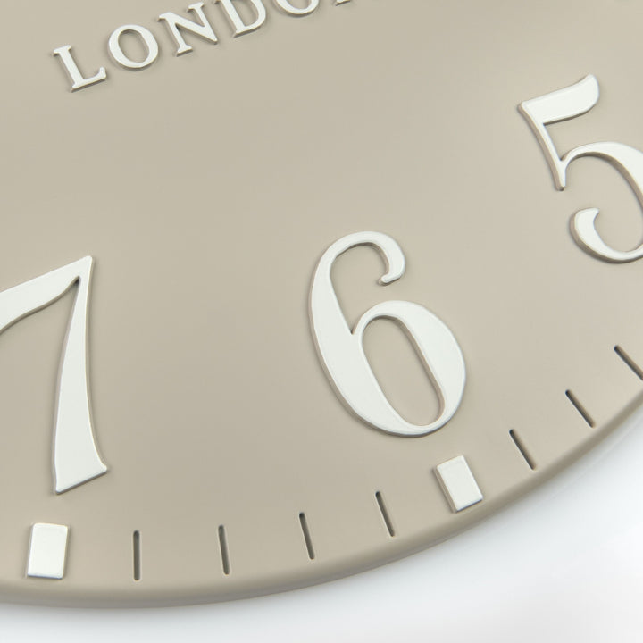 Arabian-inspired 12-foot Sand wall clock by Cornucopia Home and Gift, featuring intricate Arabic design and bold clock face.
