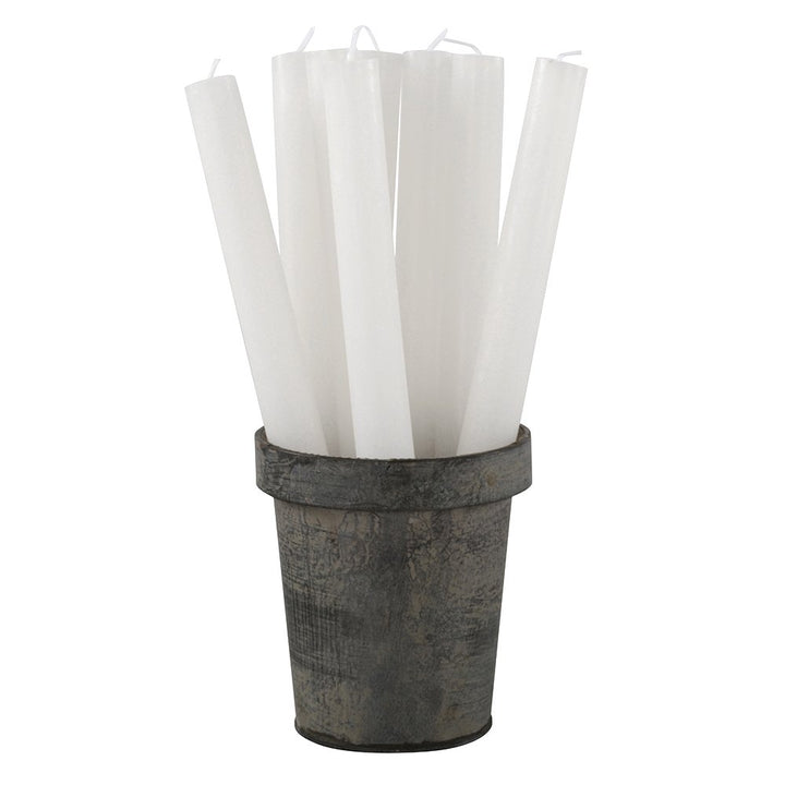 White rustic dinner candle from Grand Illusions by Cornucopia Home and Gift, shown in a classic design suitable for elegant table settings.