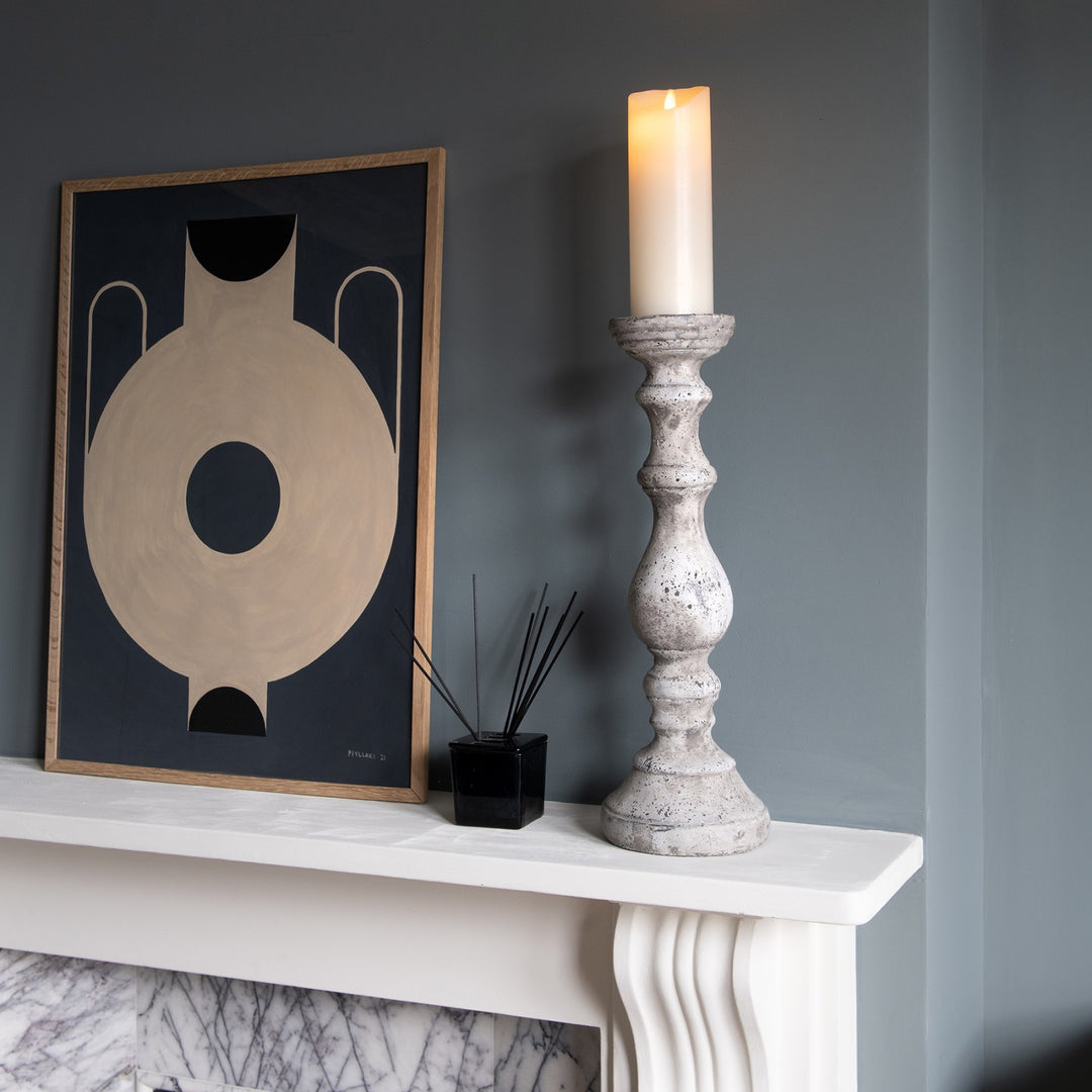 Birkdale Pillar Stone Candleholder by Cornucopia Home and Gift, featuring a textured stone design for decorative candle display.