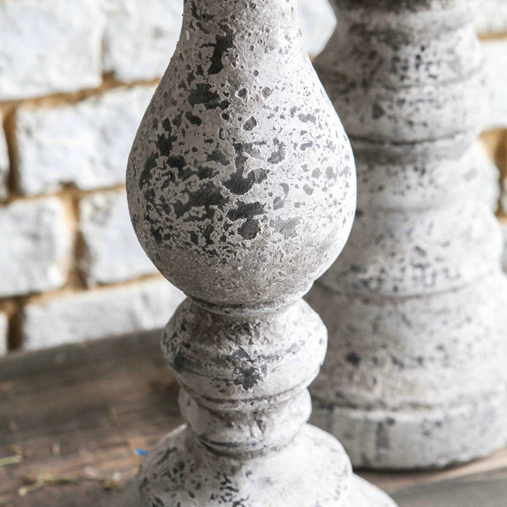 Birkdale Pillar Stone Candleholder by Cornucopia Home and Gift, featuring a textured stone design with a candle slot for decorative lighting.