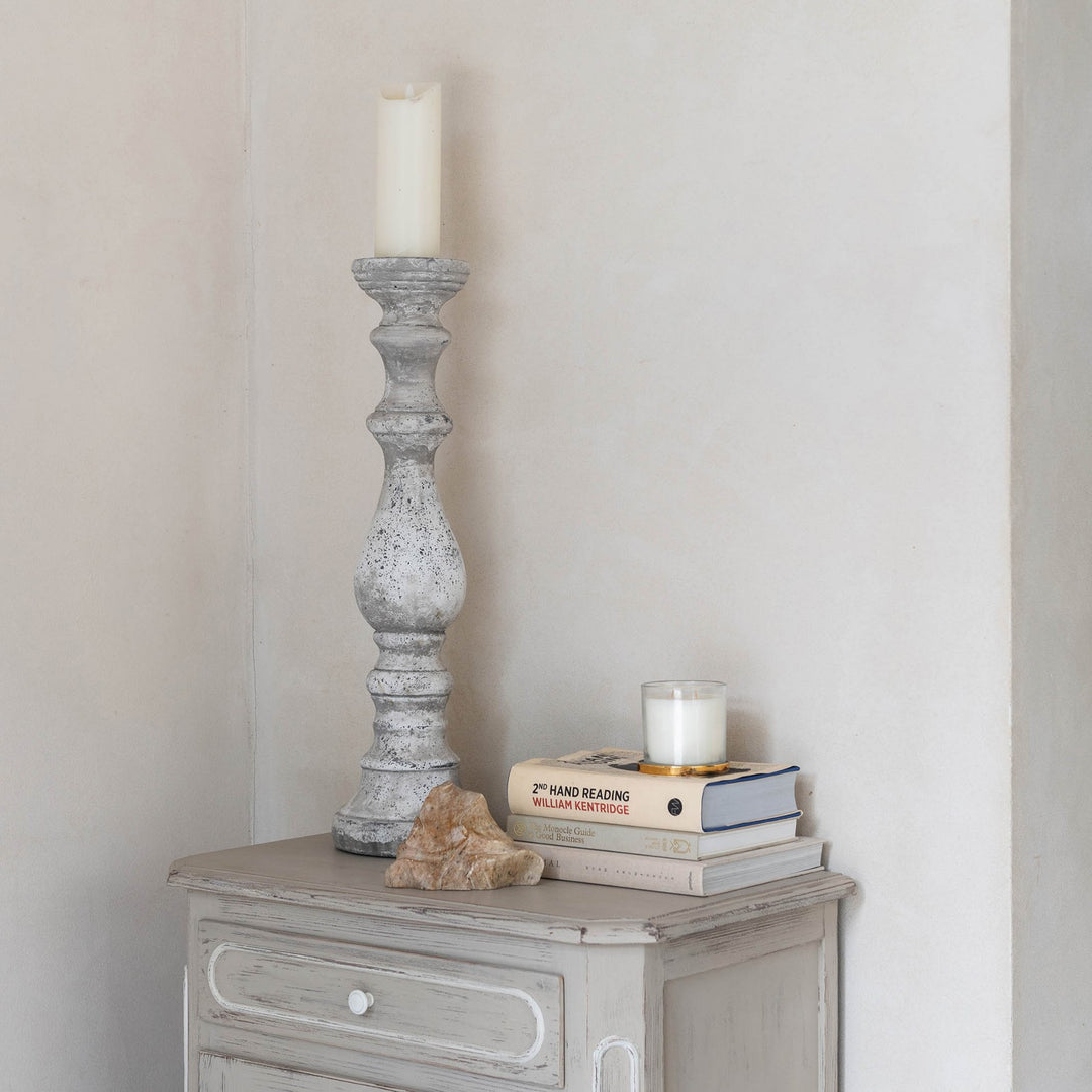 Cornucopia Home and Gift Birkdale Pillar Stone Candleholder, sturdy beige pillar with textured stone appearance, perfect for decorative lighting.
